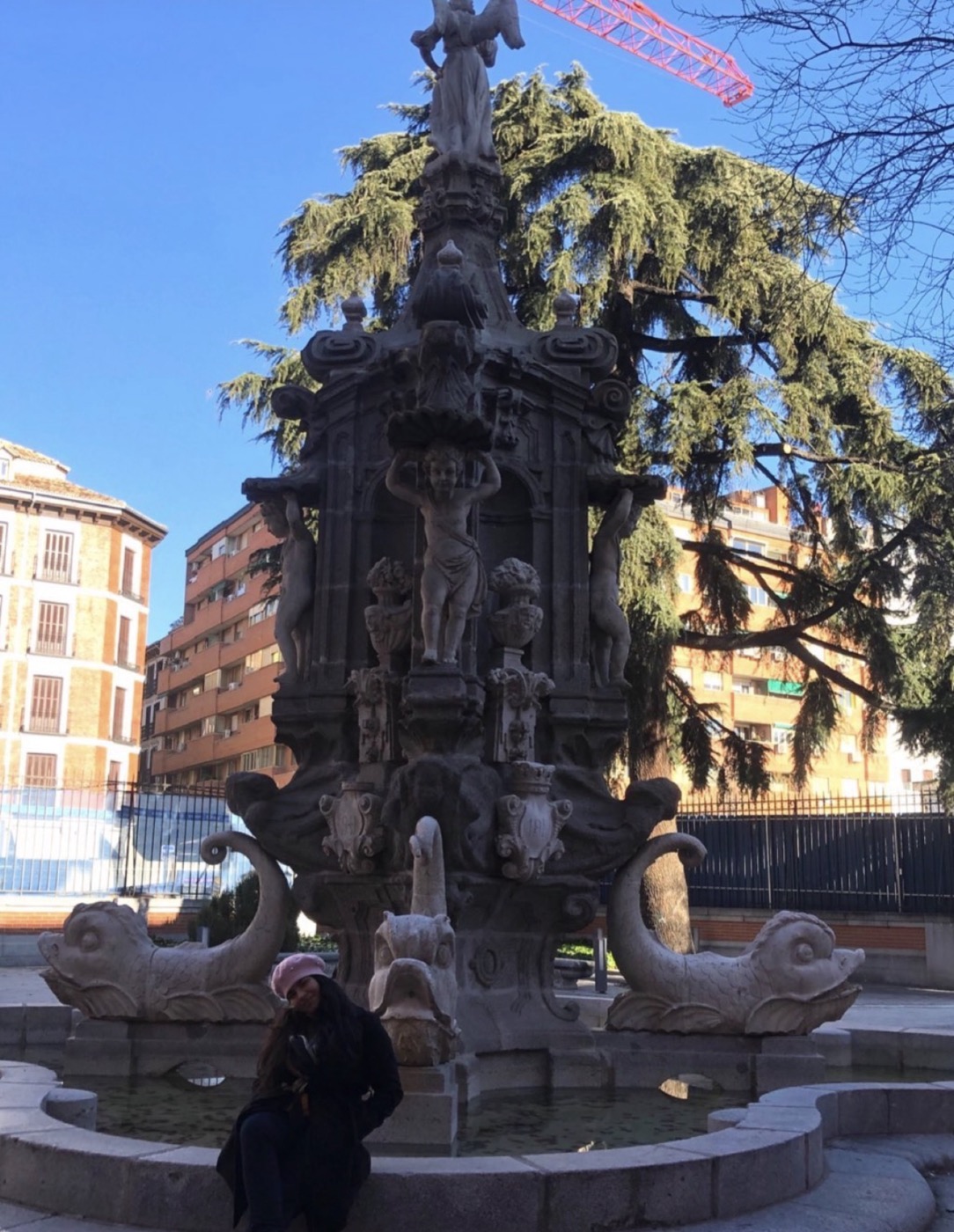 Yeraldin at a Baroque stone fountain in Madrid, 2020